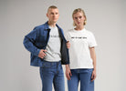 Models wearing sustainable denim outfits, highlighting a blue denim jacket and jeans with eco-friendly t-shirts.
